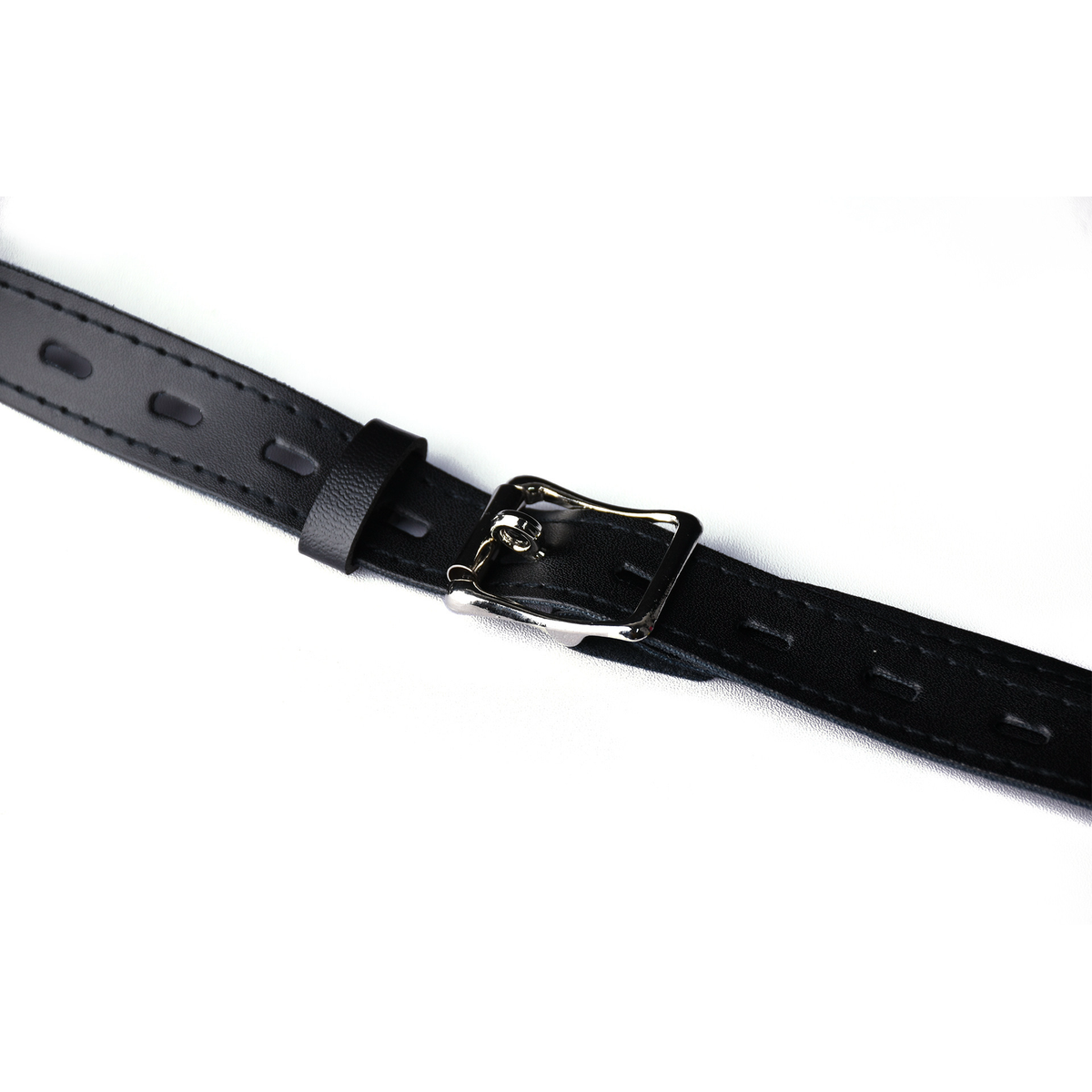 Buckle and adjustment holes on the black PU leather belt