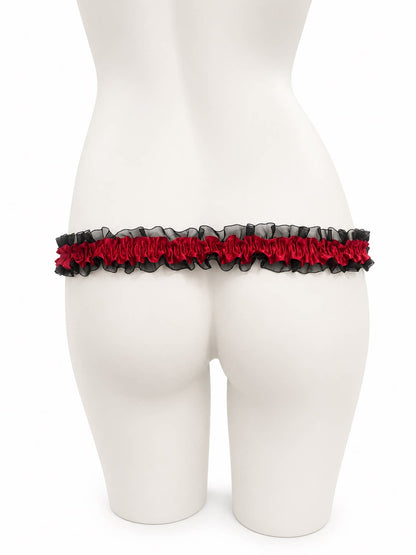 Black and red lace single support strap, rear view
